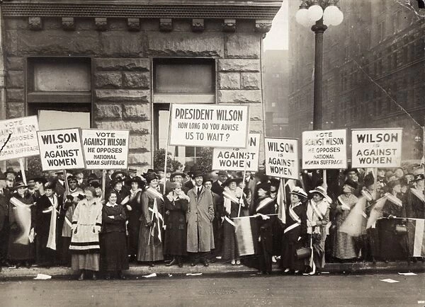 SUFFRAGE PROTEST, 1916. Suffragettes protesting against Woodrow Wilson in Chicago, Illinois