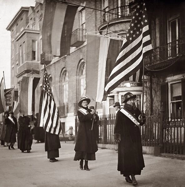 SUFFRAGETTE MARCH, 1917. Hazel Hunkins-Hallinan leading a picket line of suffragettes