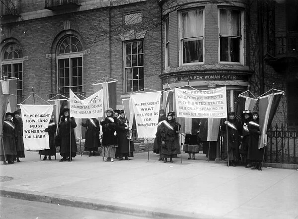 SUFFRAGETTES, 1917. Group of women suffragettes outside the headquarters of the