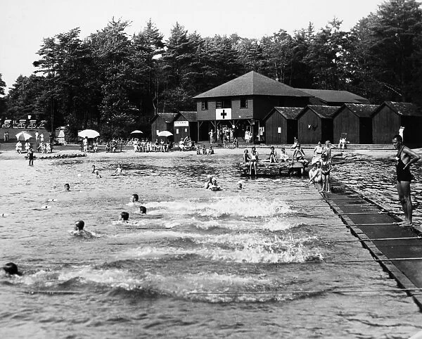 SWIMMING, 1920. An outdoor pool scene at a Pennsylvania resort. Photograph