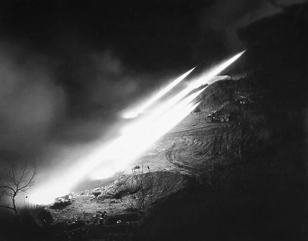 T-66 multiple rocket launchers, of the 40th U. S. Infantry Division, fire salves of rockets at North Korean positions, November 1952