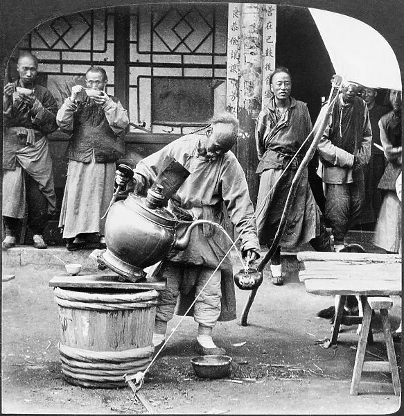 A tea seller on the street in Moukden, Manchuria. Stereograph, c1906