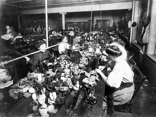 TEDDY BEAR FACTORY, c1915. Women at work making teddy bears in an American factory