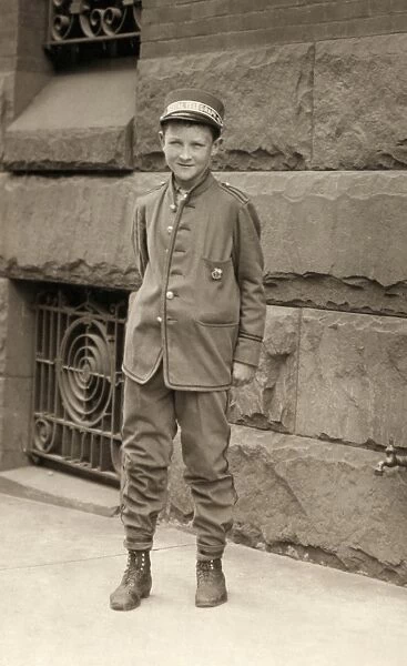 TELEGRAPH MESSENGER, 1910. A 14-year-old telegraph messenger in Wilmington, Delaware