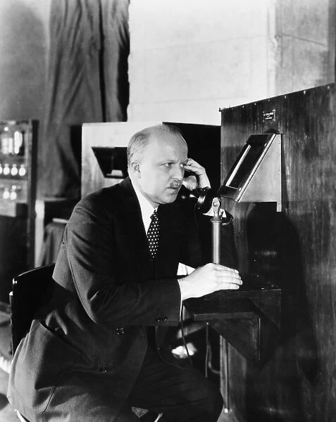 TELEVISION, 1927. Walter S. Gifford, president of AT&T, speaking with President
