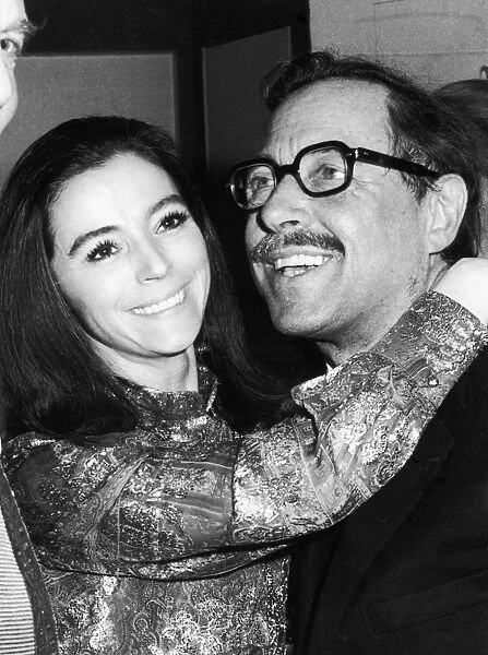 TENNESSEE WILLIAMS (1911-1983). American playwright. Williams gets a hug from Maria Pavan, the star of the Broadway revival of his play Camino Real, on opening night. Photograph, 8 January 1970