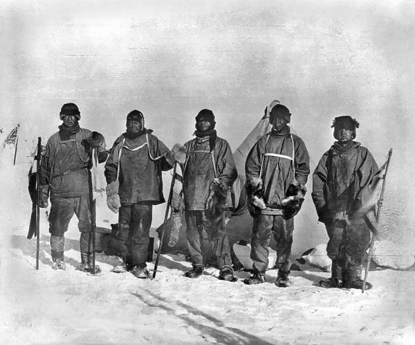 TERRA NOVA EXPEDITION. Left to right: Edward Wilson, Captain Robert Falcon Scott, Edgar Evans, Lawrence Oates and Henry Bowers. Members of the Terra Nova Expedition, photographed at the South Pole in January 1912, in front of Roald Amundsens tent, who reached the goal one month earlier. Photograph by Herbert Ponting