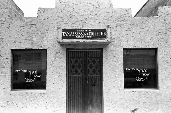 TEXAS: TAX OFFICE, 1939. Tax collectors office in Harlingen, Texas. Photograph by Russell Lee