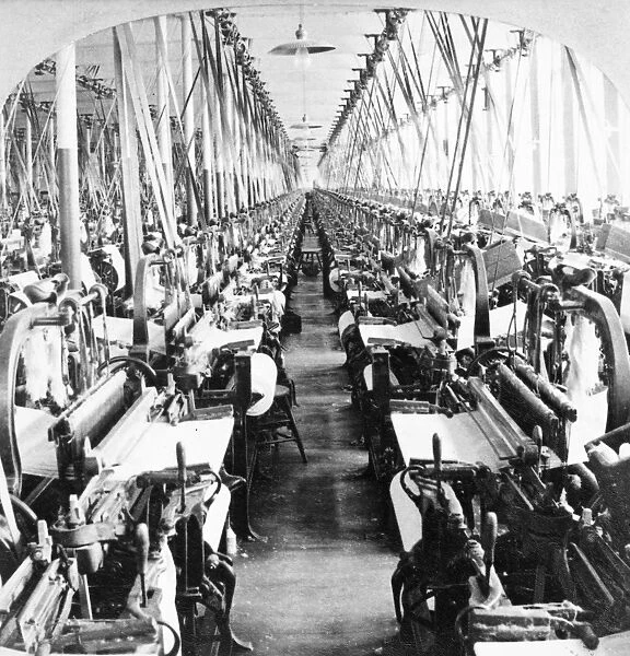 TEXTILE MILL: POWER LOOMS. Power looms in a textile mill at Fall River, Massachusetts