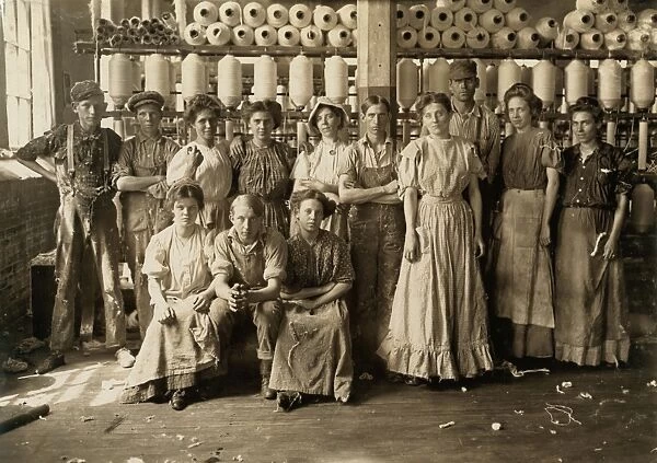 TEXTILE MILL WORKERS, 1908. A group of textile mill workers at the Indianapolis