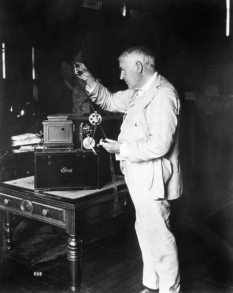 THOMAS EDISON (1847-1931). American inventor. With a Home Projecting Kinetoscope