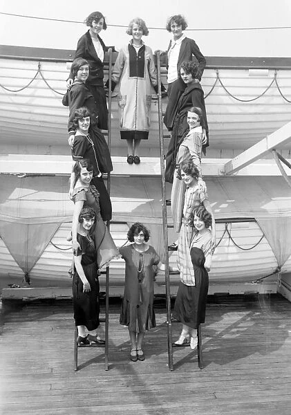 TILLER GIRLS, c1920. The Tiller Girls posing aboard a ship. Photograph, c1920
