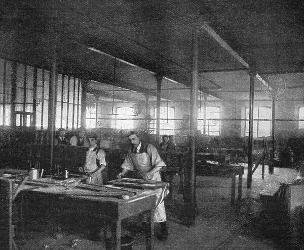 TIRE FACTORY, 1897. Workers making pockets at the Beeston pneumatic tire factory in England