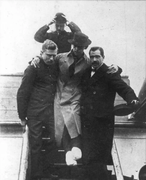 TITANIC: HAROLD BRIDE. With his feet crushed and frostbitten, second wireless operator of the Titanic leaves the Carpathia