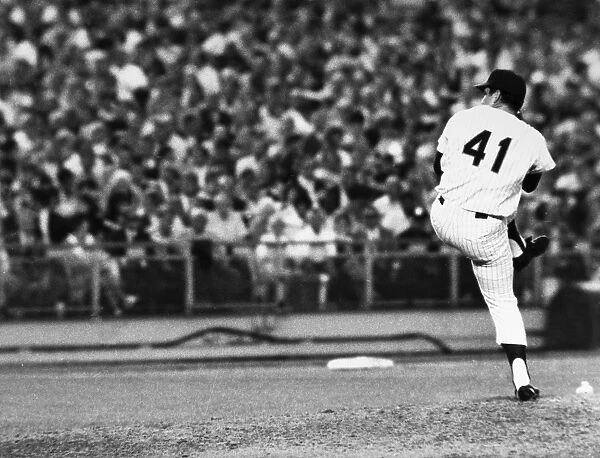 TOM SEAVER (1944- ). George Thomas Seaver, known as Tom. American baseball pitcher. Delivering a pitch during the second inning of his one-hit performance for the New York Mets against the Chicago Cubs, at Shea Stadium in Queens, New York City, 9 July 1969
