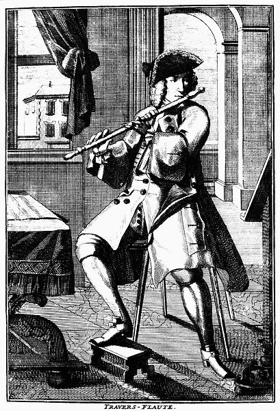 TRAVERSE FLUTE, c1720. Line engraving by Johann Christoph Weigel of a musician playing a traverse flute, from Weigels Musikalisches Theatrum, Nuremberg, 1715-1725