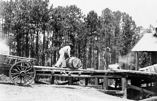 TURPENTINE DISTILLERY, 1937. African Americans working in a turpentine distillery