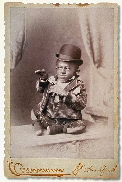 TURTLE BOY, c1895. George Williams, born with misshapen limbs and standing 18 inches tall