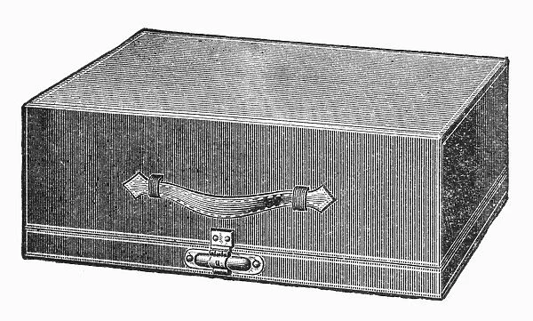 TYPEWRITER CASE, 1889. Leather carrying case for the Victor typewriter. Wood engraving, American, 1889