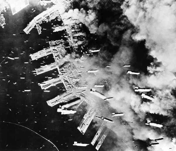 U. S. B-29 bombers drop thousands of bombs on Kobe, Japan, during World War II, May-June 1945