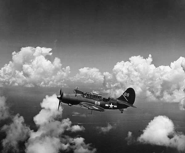 U. S. Navy Air Force Helldiver, a cannon-firing warplane, in the Pacific Theater. Photographed August 1944