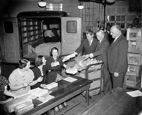 UNEMPLOYMENT CENSUS, 1937. Census directors John D. Biggers, William L. Austin and Frederick A. Gosnell give final instructions to female clerks receiving completed questionnaires from the Unemployment Census of 1937. Photograph, 24 November 1937