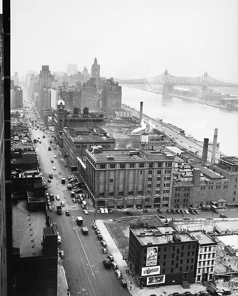 UNITED NATIONS: SITE, 1946. View, looking north from 41st Street, of the site of the United Nations headquarters in New York City, December 1946. The Queensborough Bridge is in the background