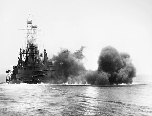 USS MICHIGAN, 1912. The USS Michigan firing a broadside. Photograph by Enrique Muller