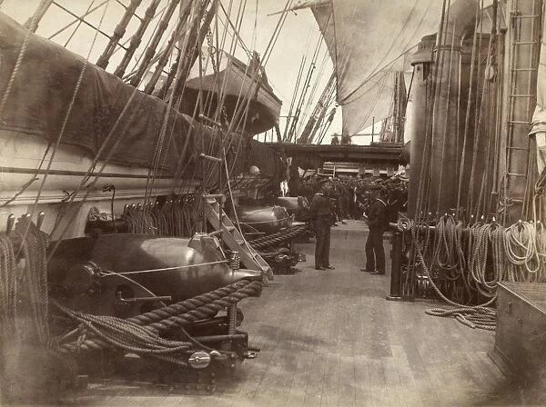 USS MOHICAN: GUN DECK, 1885. An argument among sailors on the gun deck of the steam