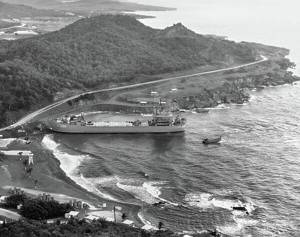 The USS Terrebonne Parish (LST-1156) tank landing ship docking at Windmill Beach, Guantanamo Bay, Cuba, during the Cuban Missile Crisis, 2 November 1962