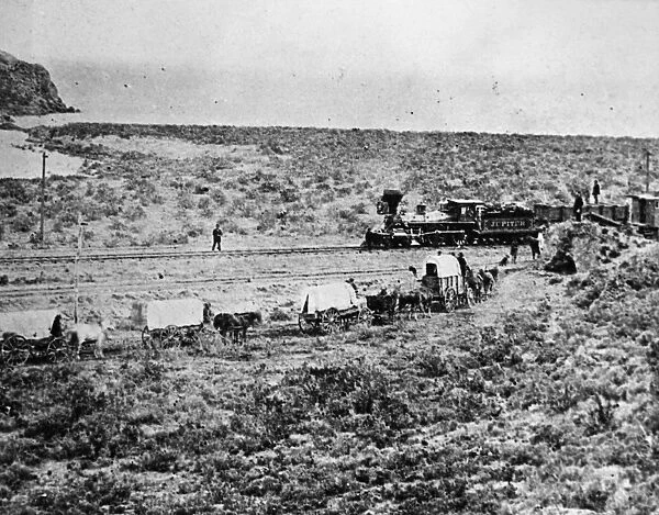 UTAH: RAILROAD, 1869. A train on its way to Promontory Point for the driving of