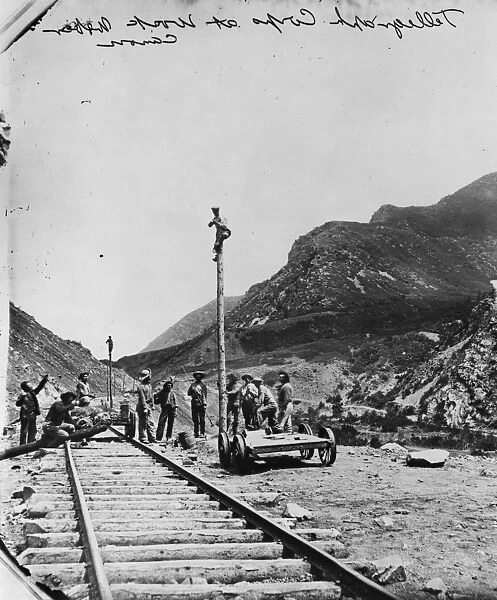 UTAH: TELEGRAPH, 1869. Workers constructing telegraph systems along railroad tracks