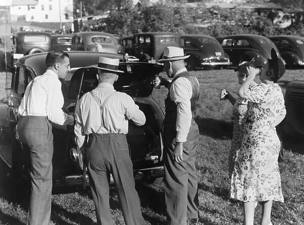 VERMONT: FAIR, 1941. Men and women drinking beer at the Worlds Fair in Tunbridge, Vermont