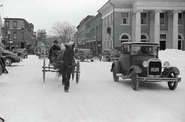 VERMONT: WOODSTOCK, 1940. Woodstock, Vermont, on Saturday afternoon after a snow storm
