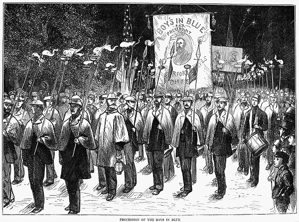 VETERAN MARCH, 1876. American Civil War veterans carrying the torch for Rutherford B. Hayes in Brooklyn, New York. Wood engraving from a contemporary American newspaper