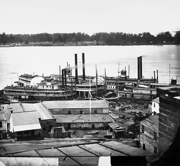 VICKSBURG, 1864. Levee and steamboat at Vicksburg, Mississippi. Photographed by William R. Pywell, February 1864