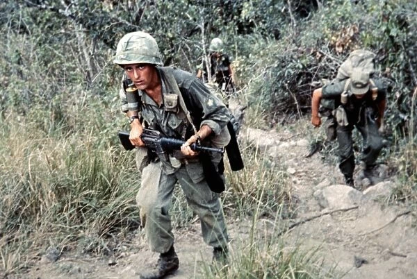 VIETNAM WAR, 1966. Members of a long range reconnaissance patrol team from the