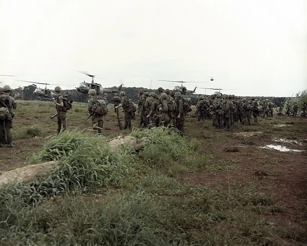 VIETNAM WAR, 1966. Troops from the 173rd Airborne Brigade being airlifted by UH-1D