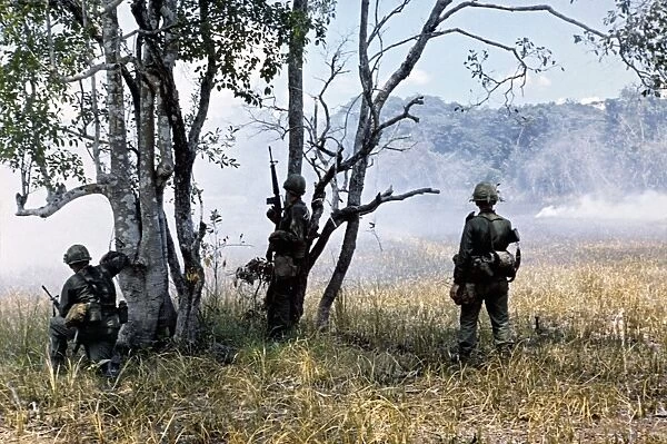 VIETNAM WAR, 1966. Troops of the 1st Cavalry Division waiting for a helicopter