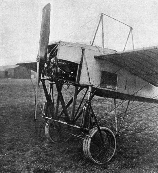 Front view of a Bleriot military monoplane with triple wheels and a glass window. Photograph, 1911