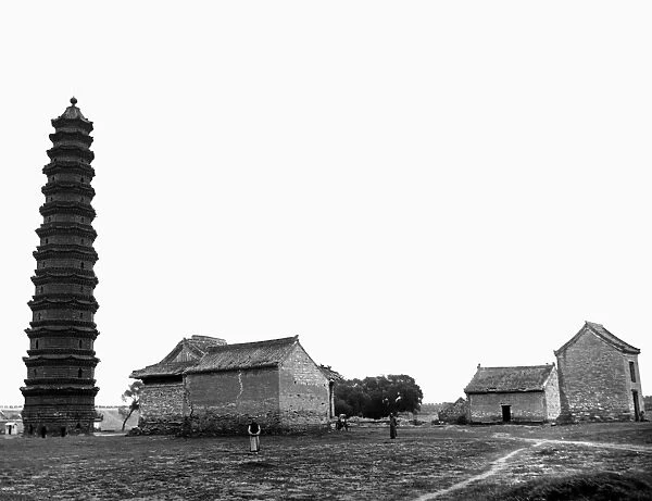 A view of the Iron Pagoda, built in the mid-11th century, at the Youguo monastery in Kaifeng, China. Photographed c1912