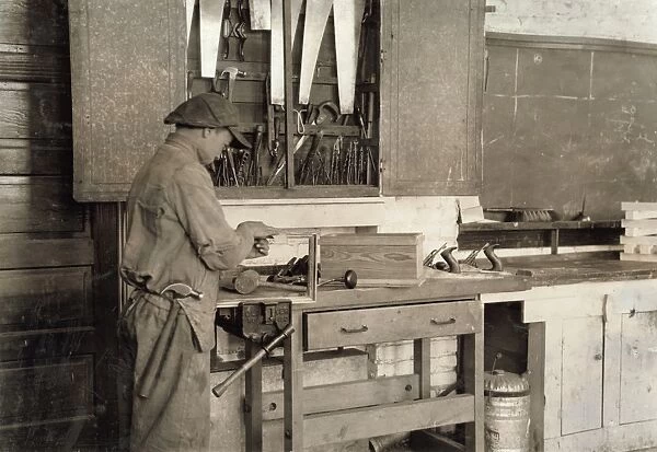 VOCATIONAL SCHOOL, 1917. Student working at Pauls Valley training school, Pauls Valley, Oklahoma