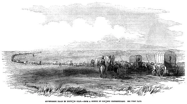 WAGON TRAIN, 1859. A government wagon train en route to Utah. Wood engraving from an American newspaper of 1859