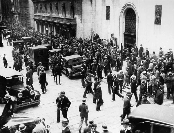 WALL STREET CRASH, 1929. Crowds gathered outside the New York Stock Exchange