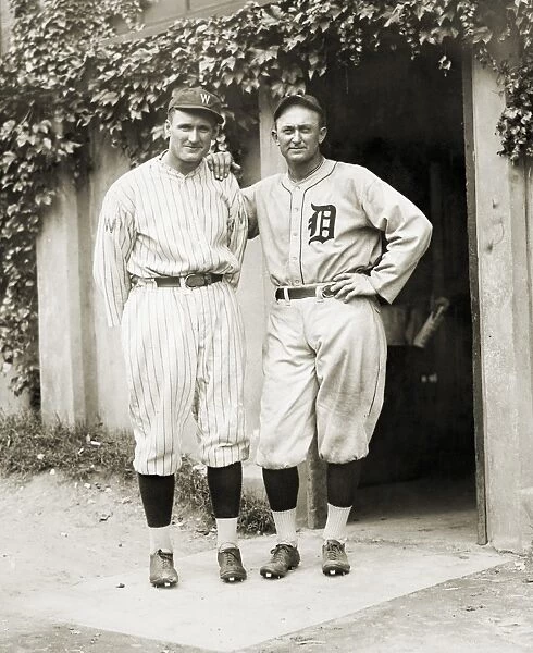 WALTER JOHNSON (1887-1946). American baseball player. Walter Johnson (left) and Ty Cobb