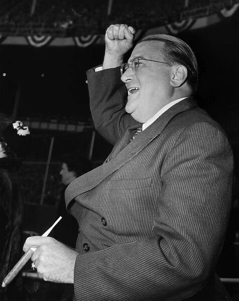 WALTER O MALLEY (1903-1979). American sports executive. As President of the Brooklyn Dodgers, cheering the team on to victory over the New York Yankees in Game 3 of the 1952 World Series at Yankee Stadium in the Bronx, New York City, 3 October 1952