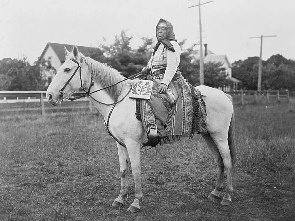 WASCO RIDER, c1908. Kate, a Wasco woman on horseback. Photographed by J. D. Drake, c1908