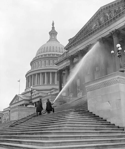 WASHINGTON, D. C. c1937. Fireman cleaning the Senate side of Capitol building in Washington D