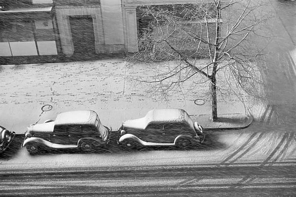 WASHINGTON D. C. : SNOW, 1938. A snow storm in Washington, D. C. Photograph by Russell Lee