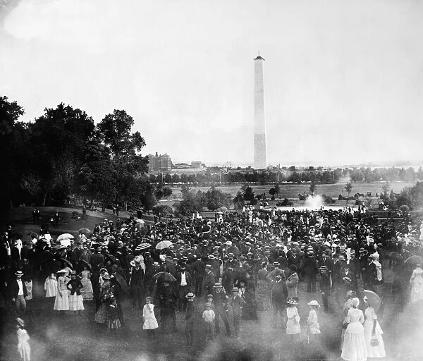 WASHINGTON MONUMENT, 1883. Crowds gathered on the grounds of the White House on Easter Monday